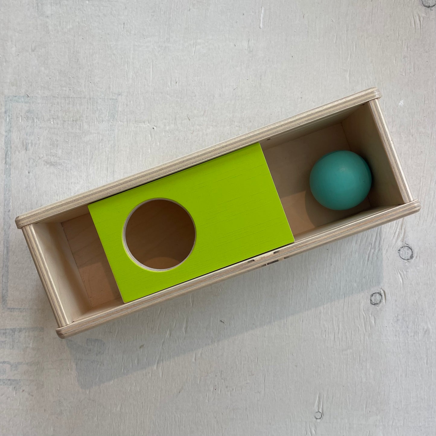 Boîte coulissante Cache et trouve, par Lovevery