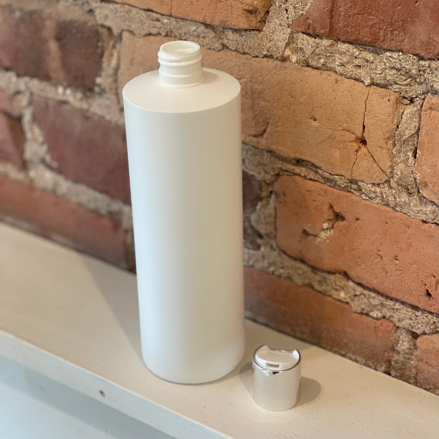Bouteille en plastique avec bec verseur