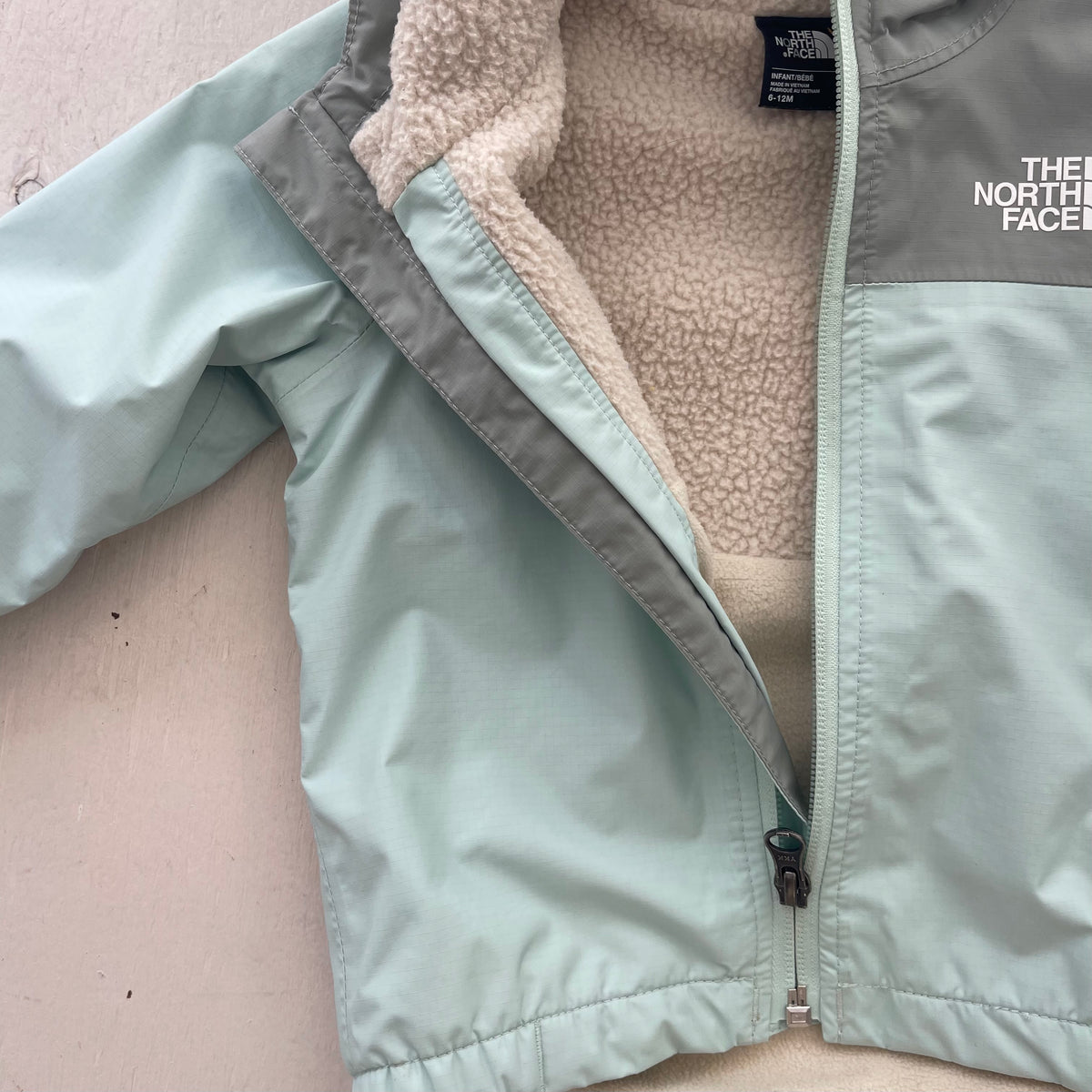 Manteau mi-saison Warm Storm 6-12M, par The North Face