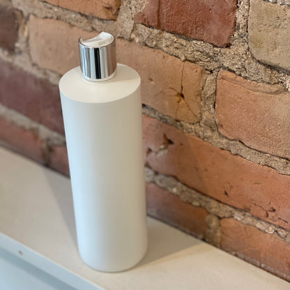 Bouteille en plastique avec bec verseur