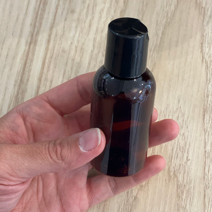 Bouteille en plastique ambré bec verseur