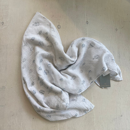 Couverture en mousseline, par Aden + Anais